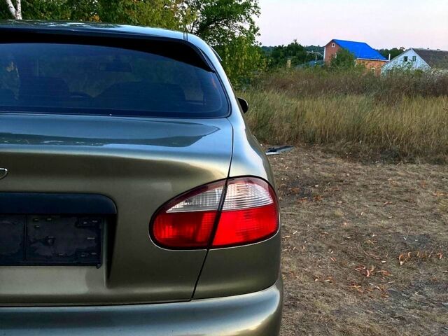 Зеленый Дэу Ланос, объемом двигателя 1.5 л и пробегом 156 тыс. км за 2799 $, фото 5 на Automoto.ua