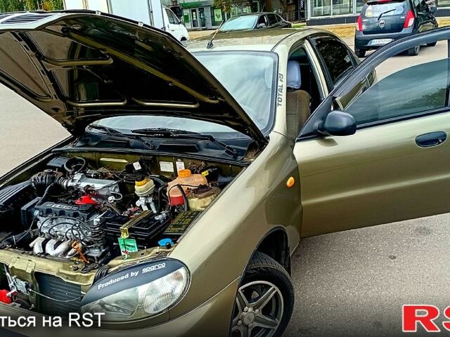 Зеленый Дэу Ланос, объемом двигателя 1.5 л и пробегом 250 тыс. км за 1300 $, фото 3 на Automoto.ua