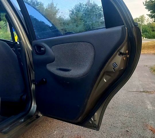 Зеленый Дэу Ланос, объемом двигателя 1.5 л и пробегом 130 тыс. км за 2000 $, фото 2 на Automoto.ua