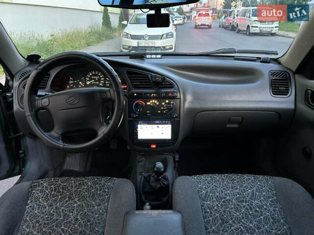 Зелений Деу Ланос, об'ємом двигуна 1.5 л та пробігом 278 тис. км за 1399 $, фото 10 на Automoto.ua