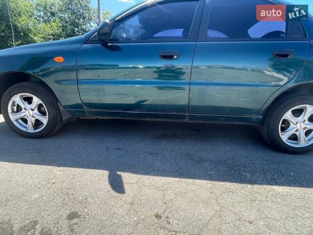 Зеленый Дэу Ланос, объемом двигателя 1.5 л и пробегом 290 тыс. км за 2550 $, фото 3 на Automoto.ua