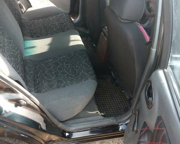 Зеленый Дэу Ланос, объемом двигателя 1.5 л и пробегом 280 тыс. км за 2200 $, фото 4 на Automoto.ua