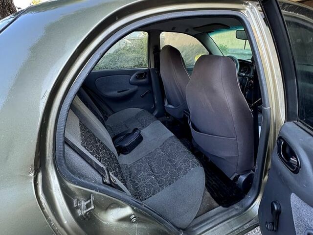 Зеленый Дэу Ланос, объемом двигателя 1.5 л и пробегом 33 тыс. км за 2200 $, фото 4 на Automoto.ua