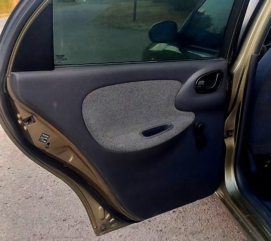 Зеленый Дэу Ланос, объемом двигателя 1.5 л и пробегом 130 тыс. км за 2000 $, фото 3 на Automoto.ua