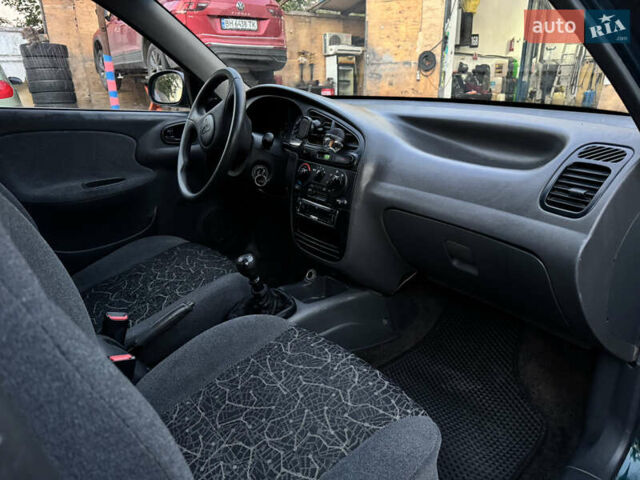 Зеленый Дэу Ланос, объемом двигателя 1.5 л и пробегом 220 тыс. км за 3100 $, фото 4 на Automoto.ua