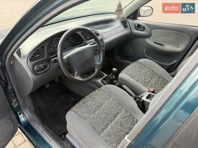 Зелений Деу Ланос, об'ємом двигуна 1.6 л та пробігом 141 тис. км за 2800 $, фото 14 на Automoto.ua