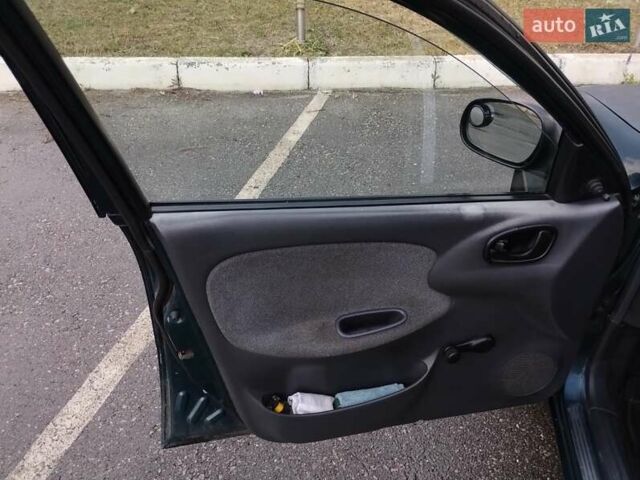 Зелений Деу Ланос, об'ємом двигуна 1.5 л та пробігом 215 тис. км за 2400 $, фото 3 на Automoto.ua