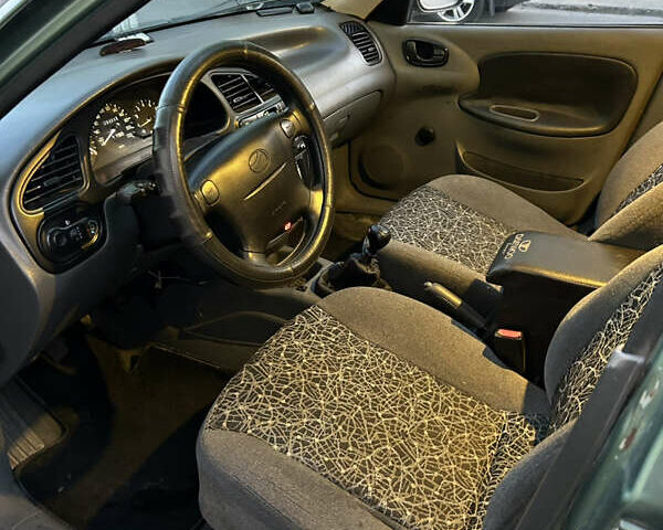 Зелений Деу Ланос, об'ємом двигуна 1.5 л та пробігом 278 тис. км за 1399 $, фото 12 на Automoto.ua