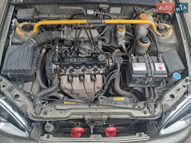 Зеленый Дэу Ланос, объемом двигателя 1.5 л и пробегом 255 тыс. км за 2100 $, фото 8 на Automoto.ua