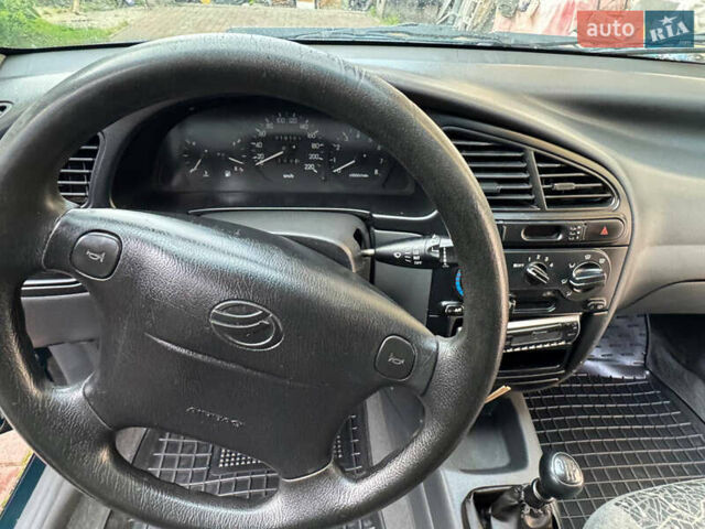 Зеленый Дэу Ланос, объемом двигателя 1.5 л и пробегом 220 тыс. км за 2900 $, фото 6 на Automoto.ua