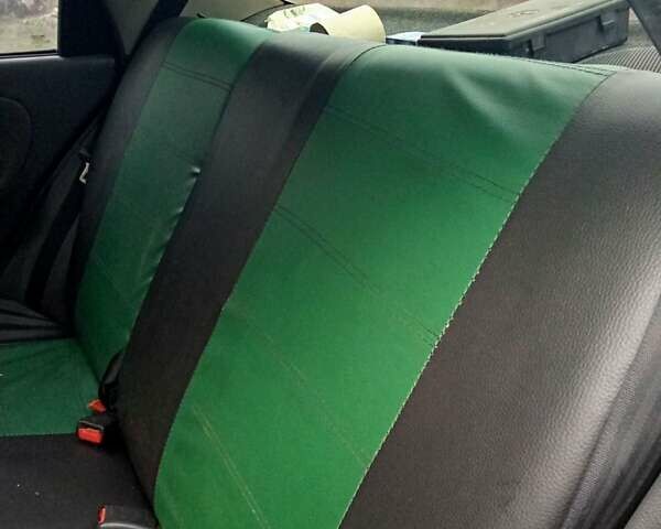 Зеленый Дэу Ланос, объемом двигателя 1.6 л и пробегом 320 тыс. км за 2000 $, фото 2 на Automoto.ua