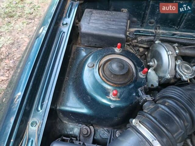 Зелений Деу Ланос, об'ємом двигуна 1.5 л та пробігом 293 тис. км за 1800 $, фото 15 на Automoto.ua