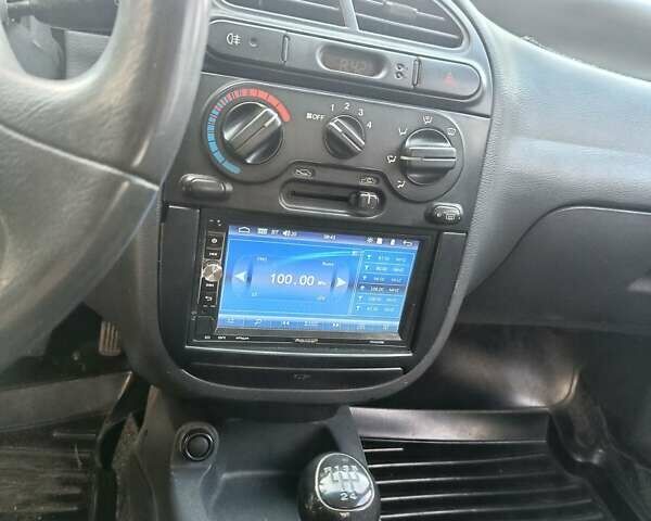 Зеленый Дэу Ланос, объемом двигателя 1.5 л и пробегом 220 тыс. км за 2600 $, фото 2 на Automoto.ua