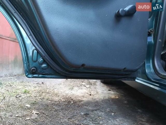 Зелений Деу Ланос, об'ємом двигуна 1.5 л та пробігом 293 тис. км за 1800 $, фото 10 на Automoto.ua