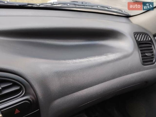 Зелений Деу Ланос, об'ємом двигуна 1.5 л та пробігом 215 тис. км за 2400 $, фото 23 на Automoto.ua