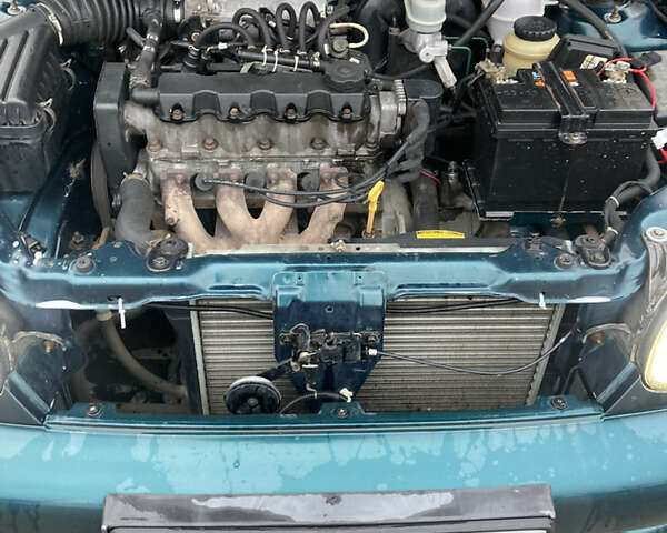 Зеленый Дэу Ланос, объемом двигателя 1.5 л и пробегом 270 тыс. км за 2000 $, фото 12 на Automoto.ua