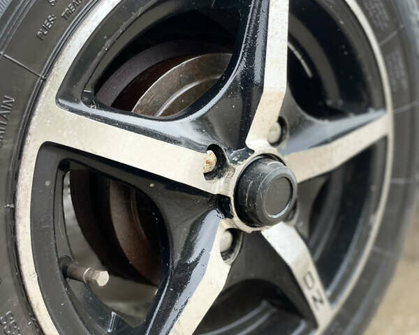 Зелений Деу Ланос, об'ємом двигуна 1.35 л та пробігом 256 тис. км за 1499 $, фото 11 на Automoto.ua