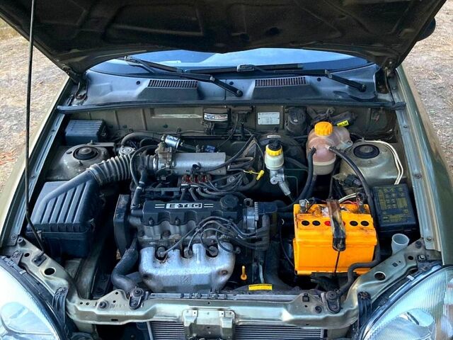 Зеленый Дэу Ланос, объемом двигателя 1.5 л и пробегом 156 тыс. км за 2799 $, фото 4 на Automoto.ua