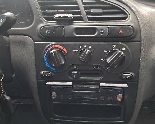 Зеленый Дэу Ланос, объемом двигателя 1.5 л и пробегом 255 тыс. км за 2100 $, фото 5 на Automoto.ua