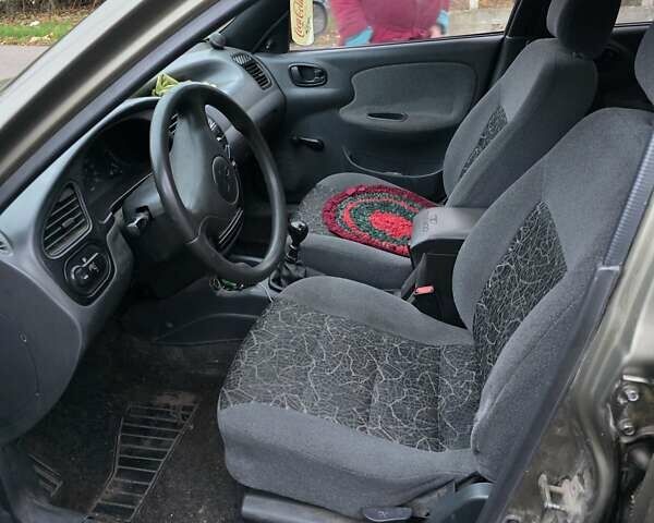 Зеленый Дэу Ланос, объемом двигателя 1.5 л и пробегом 332 тыс. км за 1650 $, фото 2 на Automoto.ua