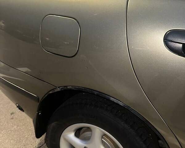 Зелений Деу Ланос, об'ємом двигуна 1.5 л та пробігом 301 тис. км за 3000 $, фото 2 на Automoto.ua