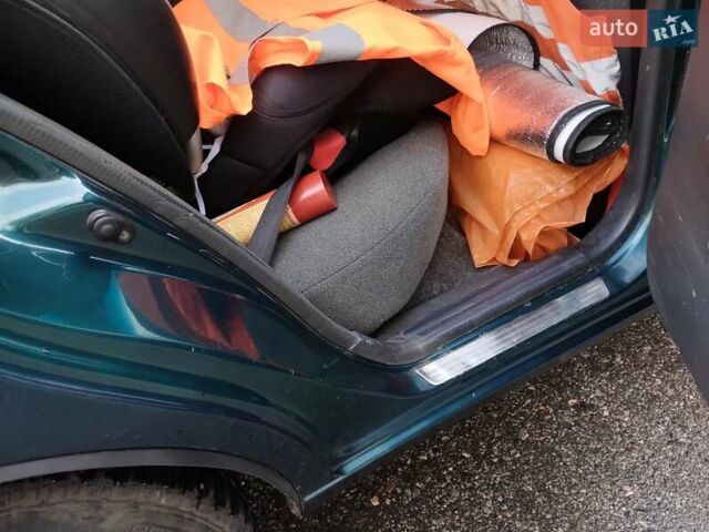 Зелений Деу Ланос, об'ємом двигуна 1.5 л та пробігом 215 тис. км за 2400 $, фото 11 на Automoto.ua