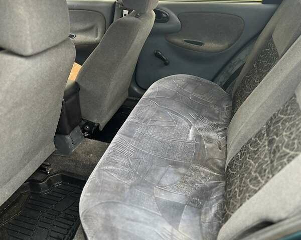 Зеленый Дэу Ланос, объемом двигателя 1.35 л и пробегом 171 тыс. км за 950 $, фото 5 на Automoto.ua