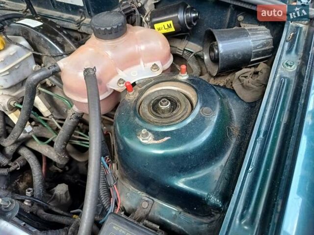 Зелений Деу Ланос, об'ємом двигуна 1.5 л та пробігом 293 тис. км за 1800 $, фото 14 на Automoto.ua