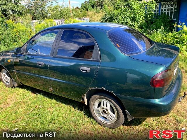 Зеленый Дэу Ланос, объемом двигателя 1.5 л и пробегом 290 тыс. км за 1000 $, фото 2 на Automoto.ua