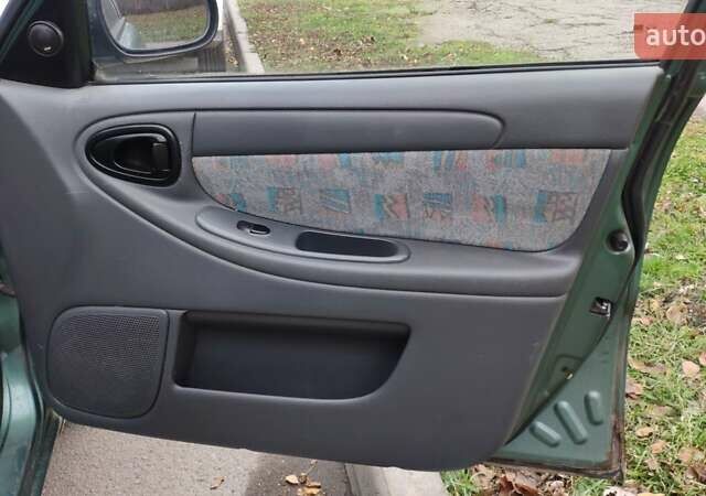 Зеленый Дэу Ланос, объемом двигателя 1.6 л и пробегом 228 тыс. км за 2100 $, фото 15 на Automoto.ua