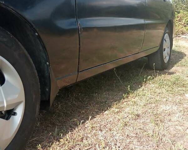 Зеленый Дэу Ланос, объемом двигателя 1.5 л и пробегом 280 тыс. км за 2200 $, фото 11 на Automoto.ua