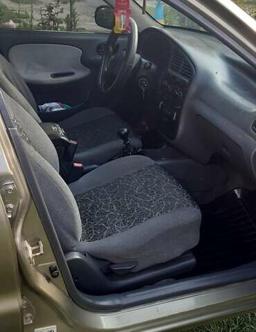 Зеленый Дэу Ланос, объемом двигателя 1.5 л и пробегом 205 тыс. км за 2500 $, фото 5 на Automoto.ua