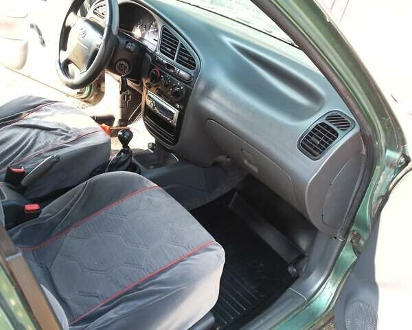 Зеленый Дэу Ланос, объемом двигателя 1.5 л и пробегом 183 тыс. км за 3500 $, фото 12 на Automoto.ua