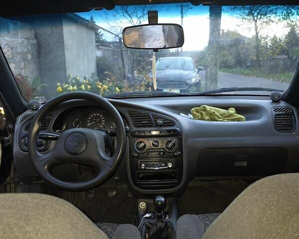 Зеленый Дэу Ланос, объемом двигателя 1.5 л и пробегом 332 тыс. км за 1650 $, фото 6 на Automoto.ua