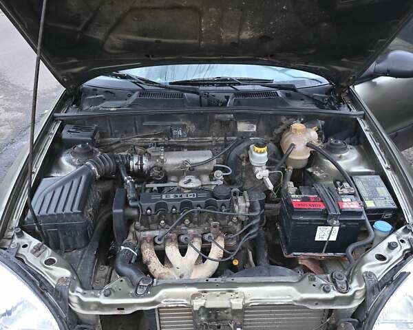 Зеленый Дэу Ланос, объемом двигателя 1.5 л и пробегом 332 тыс. км за 1650 $, фото 7 на Automoto.ua