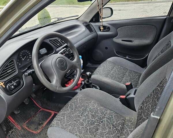 Зеленый Дэу Ланос, объемом двигателя 1.5 л и пробегом 165 тыс. км за 2500 $, фото 4 на Automoto.ua