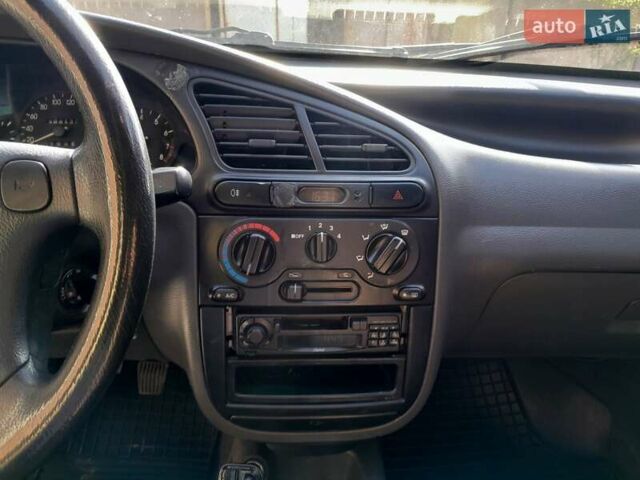 Зеленый Дэу Ланос, объемом двигателя 1.6 л и пробегом 298 тыс. км за 2600 $, фото 11 на Automoto.ua