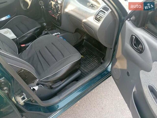 Деу Ланос 2007 у Верхнеднепровске на Automoto.ua Зелений Деу Ланос, об'ємом двигуна 1.4 л та пробігом 155 тис. км за 2999 $, фото 6 на Automoto.ua