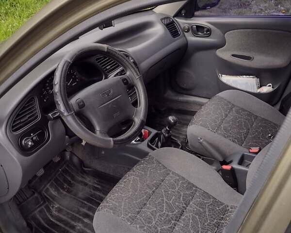 Зеленый Дэу Ланос, объемом двигателя 1.6 л и пробегом 109 тыс. км за 3400 $, фото 8 на Automoto.ua