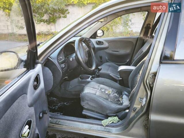 Зеленый Дэу Ланос, объемом двигателя 1.6 л и пробегом 375 тыс. км за 1800 $, фото 3 на Automoto.ua