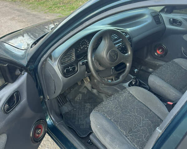 Зеленый Дэу Ланос, объемом двигателя 1.5 л и пробегом 250 тыс. км за 2800 $, фото 8 на Automoto.ua