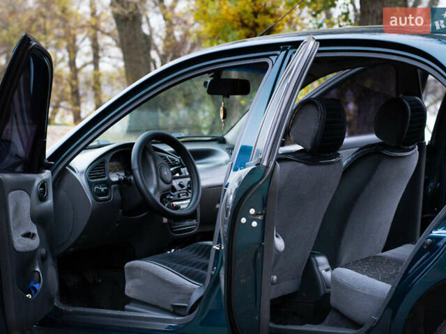 Зеленый Дэу Ланос, объемом двигателя 1.5 л и пробегом 166 тыс. км за 3500 $, фото 3 на Automoto.ua