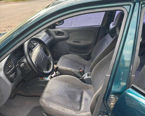 Зелений Деу Ланос, об'ємом двигуна 1.6 л та пробігом 290 тис. км за 2350 $, фото 5 на Automoto.ua