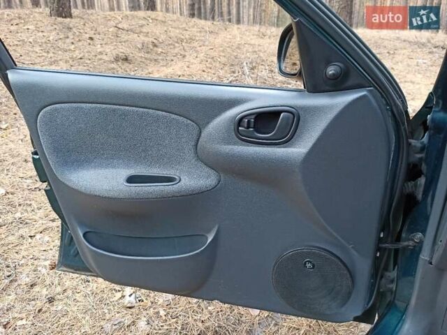 Зелений Деу Ланос, об'ємом двигуна 1.5 л та пробігом 196 тис. км за 3900 $, фото 17 на Automoto.ua