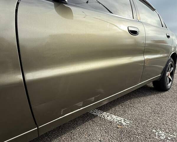 Дэу Ланос 2007 в Харькове на Automoto.ua Зеленый Дэу Ланос, объемом двигателя 1.6 л и пробегом 150 тыс. км за 2600 $, фото 15 на Automoto.ua