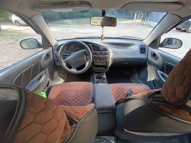 Зеленый Дэу Ланос, объемом двигателя 1.6 л и пробегом 167 тыс. км за 3000 $, фото 5 на Automoto.ua