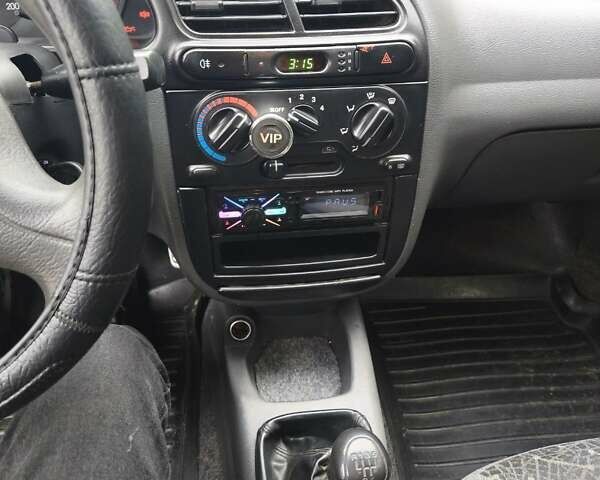 Зеленый Дэу Ланос, объемом двигателя 1.5 л и пробегом 164 тыс. км за 3200 $, фото 6 на Automoto.ua