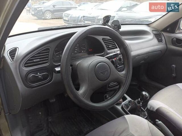 Зеленый Дэу Ланос, объемом двигателя 1.5 л и пробегом 207 тыс. км за 2450 $, фото 4 на Automoto.ua