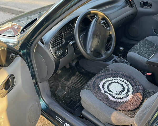 Зелений Деу Ланос, об'ємом двигуна 1.6 л та пробігом 386 тис. км за 2600 $, фото 8 на Automoto.ua