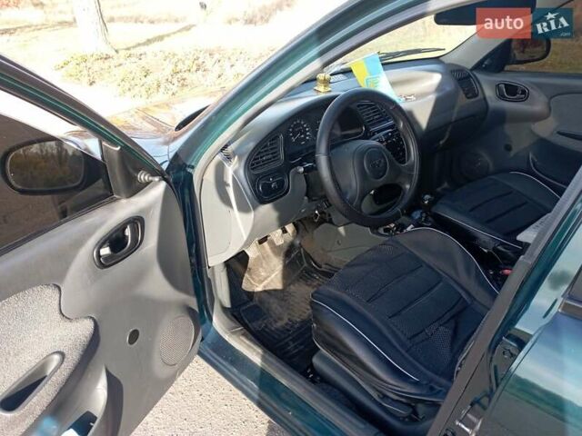 Деу Ланос 2007 у Верхнеднепровске на Automoto.ua Зелений Деу Ланос, об'ємом двигуна 1.4 л та пробігом 155 тис. км за 2999 $, фото 10 на Automoto.ua